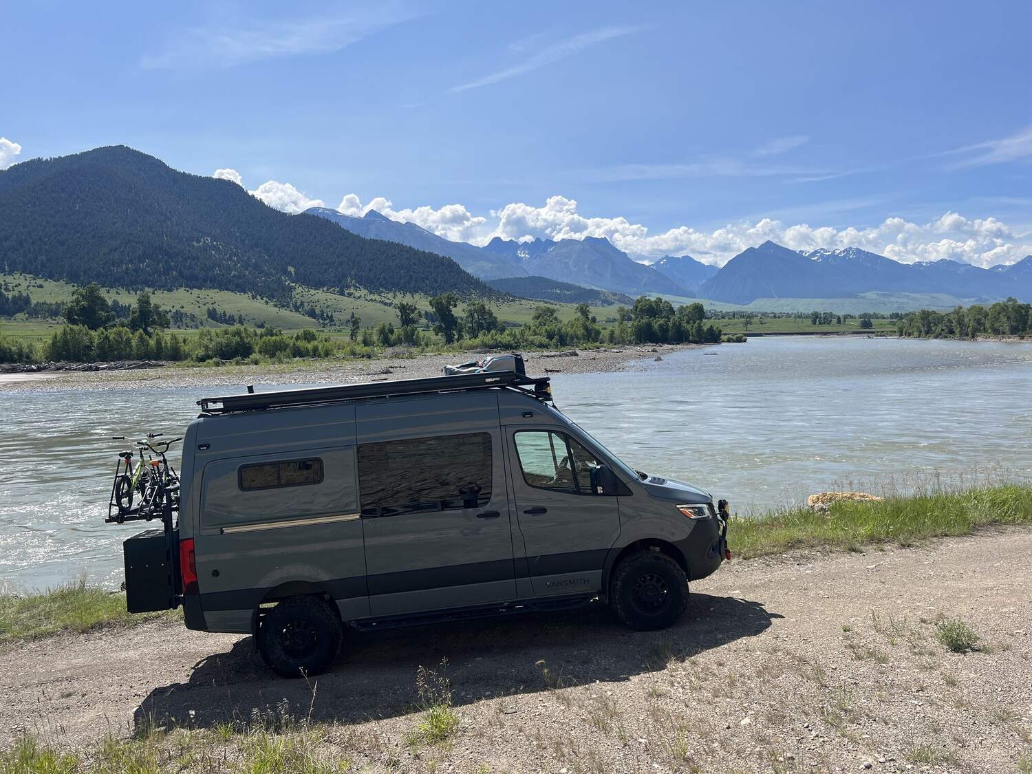 Sprinter beside the Yellowstone River with the Absaroka Range beyond