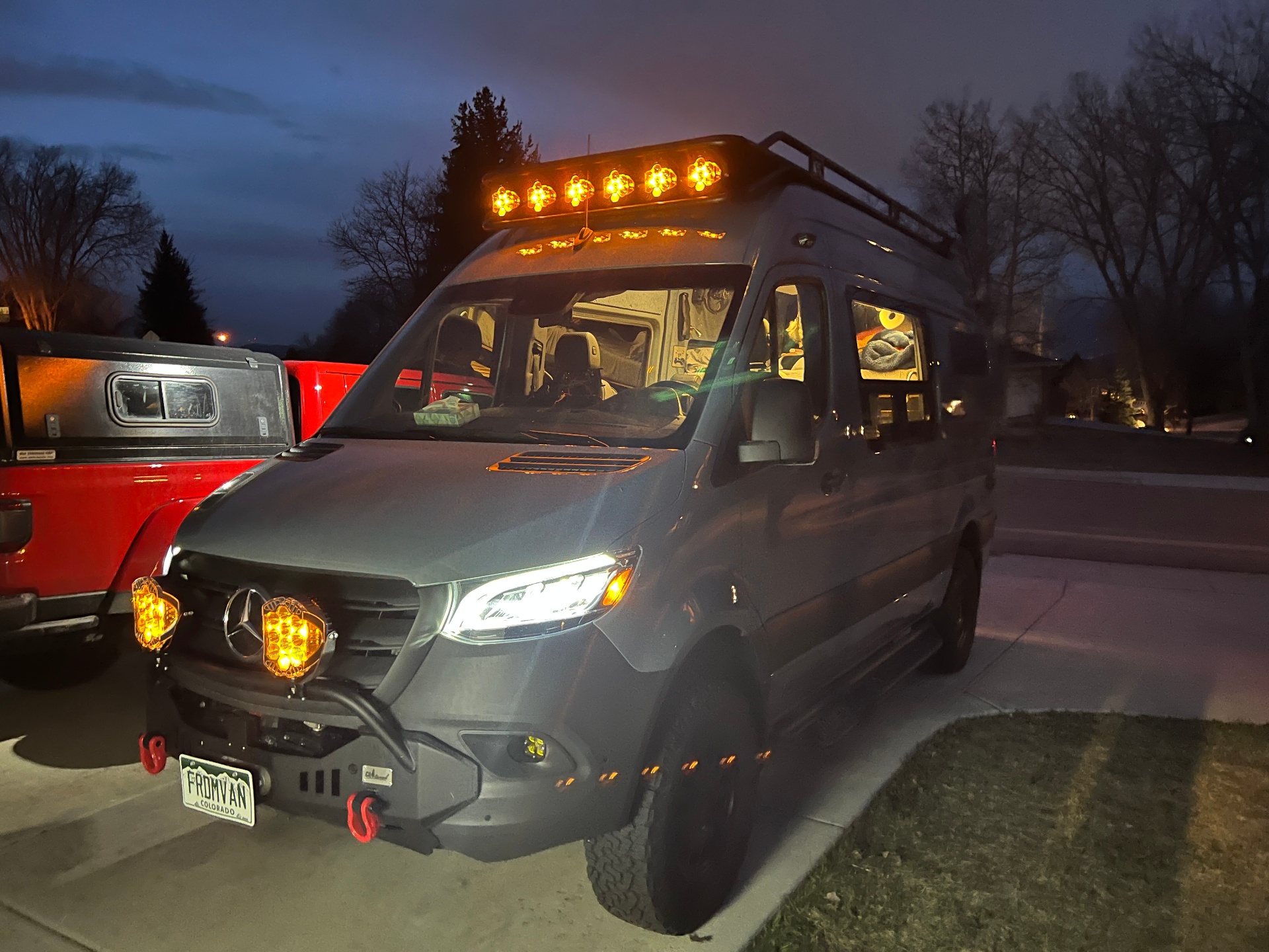 All roof and bumper lights illuminated at dusk