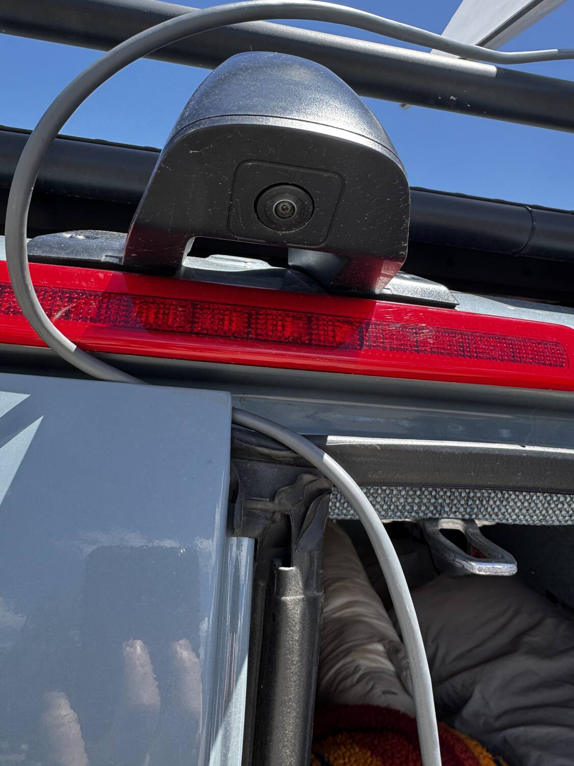 Rear-door backup camera mounted above the third brake light
