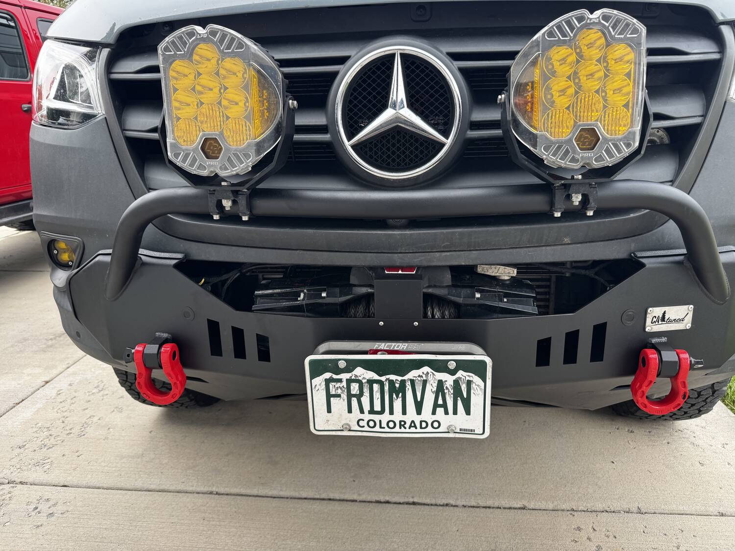 Refinished CA Tuned front bumper with LP9 lights and FRDMVAN Colorado plate