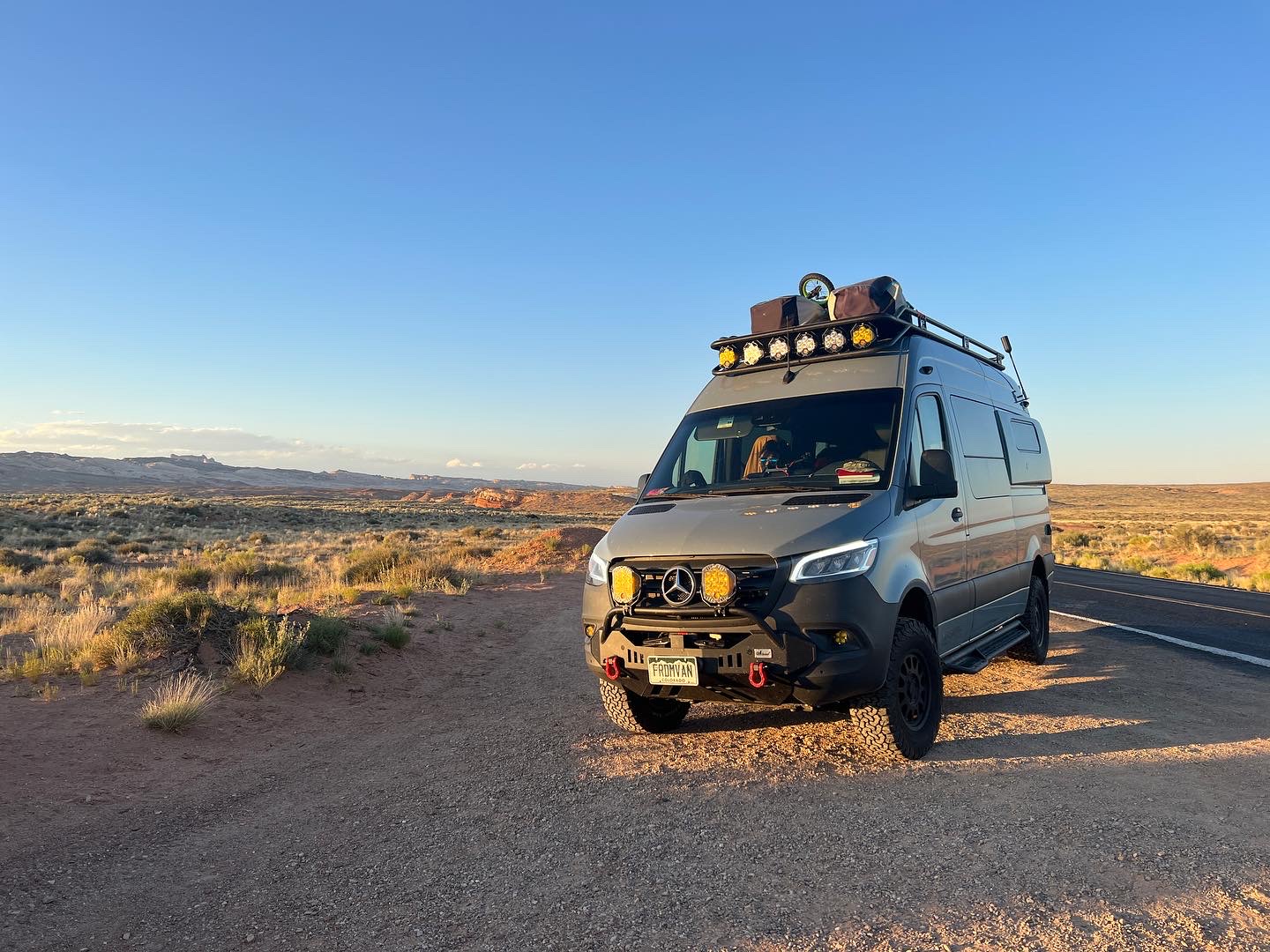 2022 Mercedes-Benz Sprinter 2500 4x4 parked at golden hour on an alpine ridge